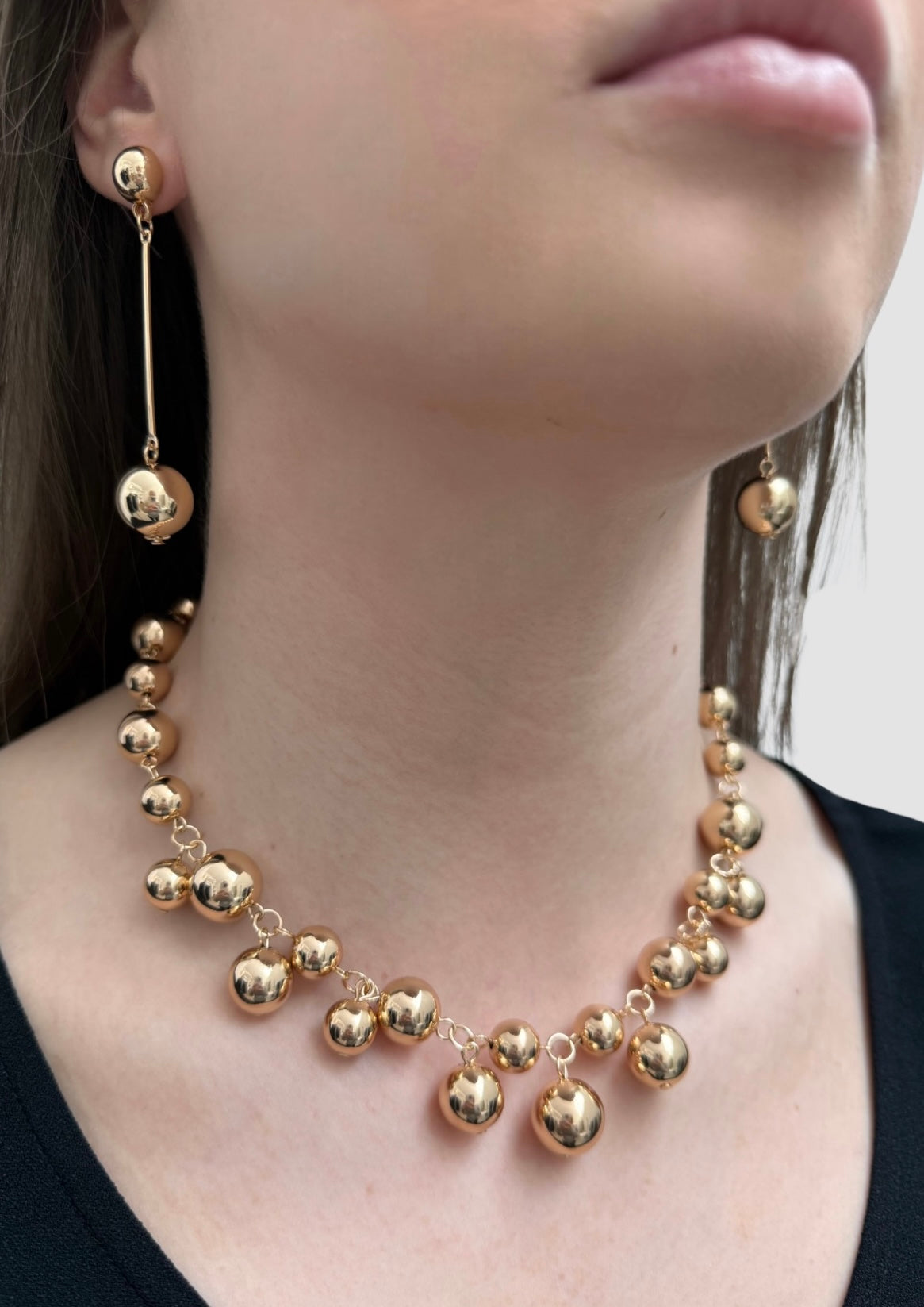 Gold bullets set necklace and earrings