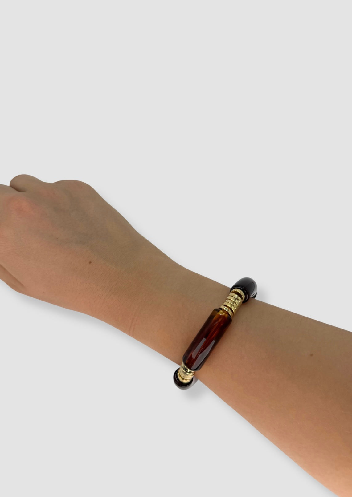 Big pipes with gold elastic bracelet Brown